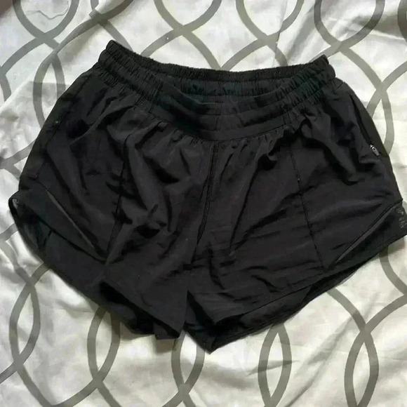 - Lululemon black hottie shorts 4” size 8 - Picture 5 of 6